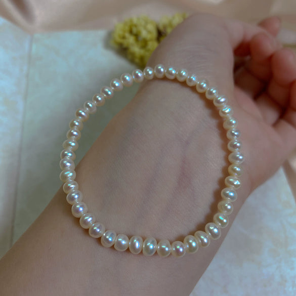 Wholesale Women's Natural Freshwater Pearl Stretch Bracelet With Elastic Cord Nearly Round Shape Simple Style