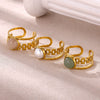 Wholesale Women's Natural Stone Stainless Steel Titanium Steel Hollow Geometric Light Luxury Style Inlaid With Gold Ring
