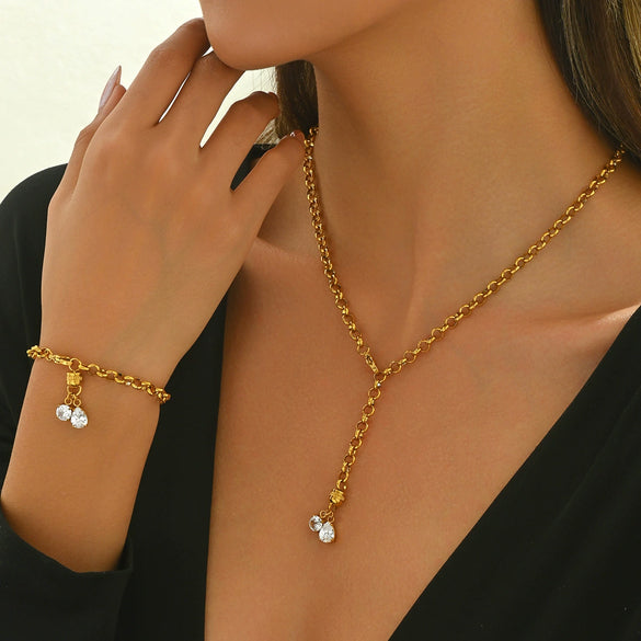 Wholesale Women's Niche Style Stainless Steel Necklace And Bracelet With Love Water Drops And Bells Electroplated Design