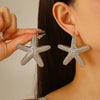 Wholesale Women's Ocean Vacation Style Exaggerated Starfish Earrings In Alloy With Electroplating