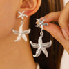 Wholesale Women's Ocean Vacation Style Exaggerated Starfish Earrings In Alloy With Electroplating
