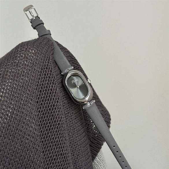 Wholesale Women's Oval Dial Super Fiber Strap Fashionable Minimalist Watch With Pin Buckle And Flat Top Tapered Crown