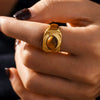 Wholesale Women's Oval Tiger Eye Ring In Textured Edge Style Gold Plated Titanium Steel With Geometric Design