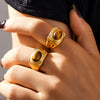 Wholesale Women's Oval Tiger Eye Ring In Textured Edge Style Gold Plated Titanium Steel With Geometric Design