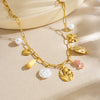 Wholesale Women's Pastoral Style Goldplated Stainless Steel Hollow Tulip Flower Bow Tie Multipendant Flat Cross Chain Necklace