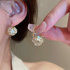 Wholesale Women's Pearl And Zircon Earrings High Sense Geometric Retro Light Luxury Electroplated