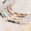 Wholesale Women's Pearl Crystal Beads And Steel Beads Necklace With Small Daisy Pattern And Electroplating Design