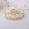 Wholesale Women's Pearl Hairpin Shark Clip With Baking Paint Bow Grip For Ponytail