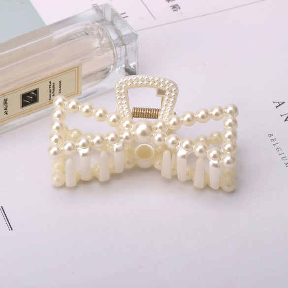 Wholesale Women's Pearl Hairpin Shark Clip With Baking Paint Bow Grip For Ponytail