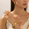 Wholesale Women's Personality Geometric Electroplated Stainless Steel Hand Jewelry And Earrings Set