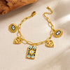 Wholesale Women's Personality Trend Goldplated Stainless Steel Heart Water Drop Bell Pattern Cut Out Pendant Jewelry Set With Cross Chain