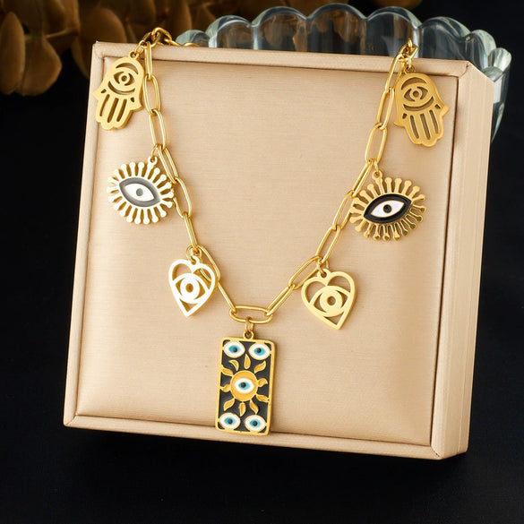 Wholesale Women's Personality Trend Goldplated Stainless Steel Heart Water Drop Bell Pattern Cut Out Pendant Jewelry Set With Cross Chain