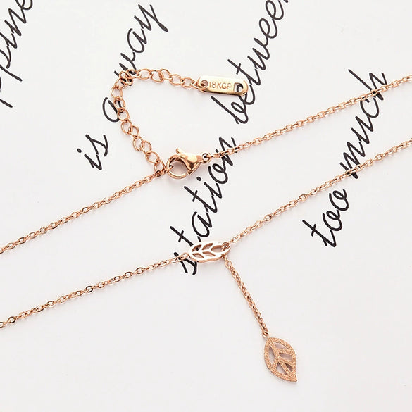Wholesale Women's Pull Adjustable Frosted Leaves Titanium Steel Rose Gold Clavicle Necklace With O Chain