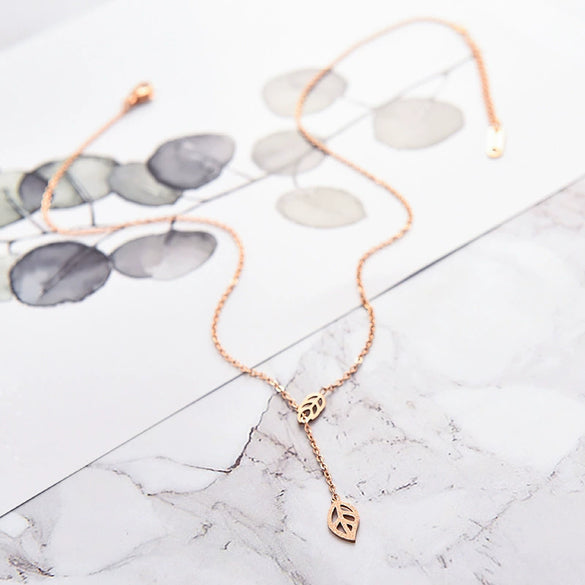 Wholesale Women's Pull Adjustable Frosted Leaves Titanium Steel Rose Gold Clavicle Necklace With O Chain