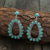 Wholesale Women's Retro Cartoon Drop Shape Hollow Inlaid Turquoise Alloy Earrings
