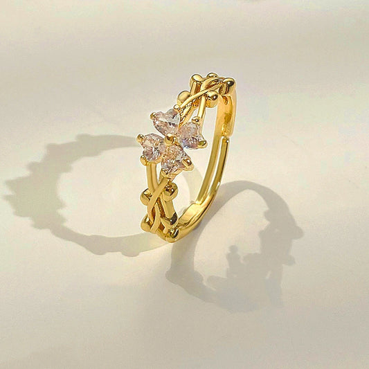 Wholesale Women's Retro Copper Ring With Microinlaid Zircon And Fourleaf Clover Flower Design
