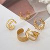 Wholesale Women's Retro Cshaped Alloy Multilayer Hollow Leaf Electroplated Ear Clip Fivepiece Set