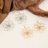 Wholesale Women's Retro Exaggerated Metal Hollow Flower Geometric Woven Earrings With Electroplating