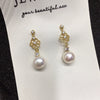 Wholesale Women's Retro Fashion Natural Freshwater Pearl Stud Earrings With Alloy Inlaid Artificial And Semiprecious Stones Oblate And Flat Round Shape