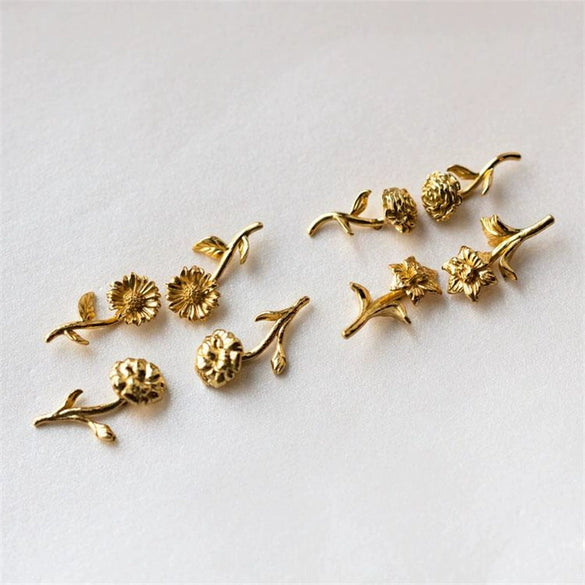 Wholesale Women's Retro Flower Copper Earrings With Real Gold Electroplating