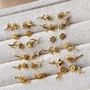 Wholesale Women's Retro Flower Copper Earrings With Real Gold Electroplating