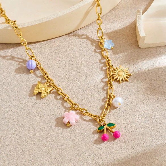 Wholesale Women's Retro Goldplated Stainless Steel Fruitshaped Sun Butterfly Pendant Necklace With O Word Chain