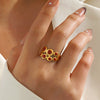Wholesale Women's Retro Hip Hop Geometric Round Red Oil Drop Titanium Steel Ring With Electroplating