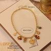 Wholesale Women's Retro Leopard Print Flower Titanium Steel Real Gold Plated Necklace In Maillard Style