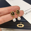 Wholesale Women's Retro Maillard Style Natural Freshwater Pearl Earrings With Alloy Inlaid Artificial And Semiprecious Stones Oblate Shape