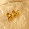 Wholesale Women's Retro Niche Geometric Fourleaf Clover Design Electroplated Titanium Steel Earrings