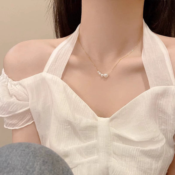 Wholesale Women's Retro Pearl Clavicle Chain Necklace Copper Geometric Heart Bow Electroplated