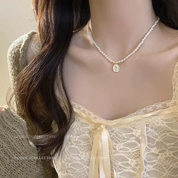 Wholesale Women's Retro Pearl Clavicle Chain Necklace Copper Geometric Heart Bow Electroplated