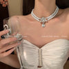 Wholesale Women's Retro Pearl Clavicle Chain Necklace Copper Geometric Heart Bow Electroplated