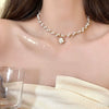 Wholesale Women's Retro Pearl Clavicle Chain Necklace Copper Geometric Heart Bow Electroplated