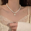 Wholesale Women's Retro Pearl Clavicle Chain Necklace Copper Geometric Heart Bow Electroplated