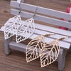 Wholesale Women's Retro Simple Alloy Leaf Pendant Earrings With Electroplating Treatment