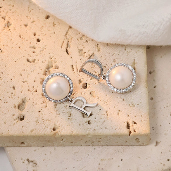 Wholesale Women's Retro Style Natural Freshwater Pearl S925 Silver Flower Zircon Nearly Round Earrings