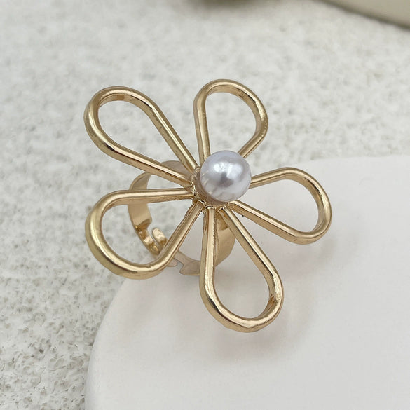 Wholesale Women's Ring Imitation Pearl Hollow Flower Geometric Electroplating
