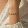 Wholesale Women's S925 Silver Distressed Hollow Cross Electroplated Bracelet