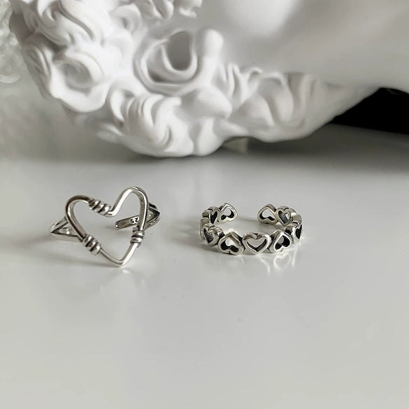 Wholesale Women's S925 Silver Hollow Love Ring With Stitching And Heart Shape Opening Design
