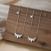 Wholesale Women's S925 Sterling Silver Geometric Inlaid Oval Marquise Stone Pendant Cross Chain Necklace