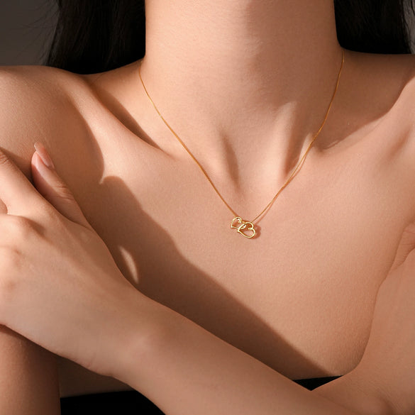 Wholesale Women's S925 Sterling Silver Interlocking Cut Out Heart Clavicle Chain Necklace With Electroplating In Retro Stylish And Classic Design