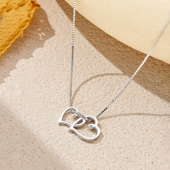 Wholesale Women's S925 Sterling Silver Interlocking Cut Out Heart Clavicle Chain Necklace With Electroplating In Retro Stylish And Classic Design
