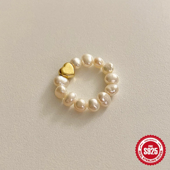 Wholesale Women's S925 Sterling Silver Love Shape Elastic Pearl Ring With Electroplating Design