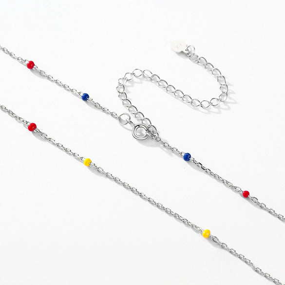 Wholesale Women's S925 Sterling Silver Rainbow Peas Clavicle Chain With Dripping Glue Design