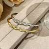 Wholesale Women's Semicircular Cross Design Goldplated Brass Bracelet With Microinlaid Diamonds Light Luxury Style