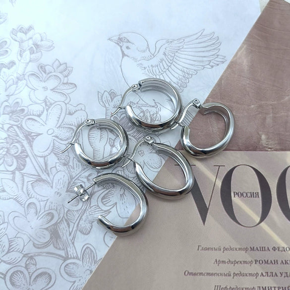 Wholesale Women's Semiround Titanium Steel Geometric Personality Earrings With Polished And Electroplated Finish