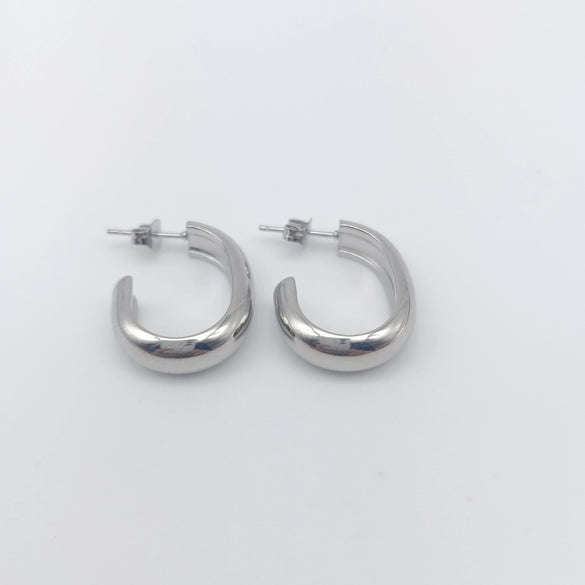 Wholesale Women's Semiround Titanium Steel Geometric Personality Earrings With Polished And Electroplated Finish