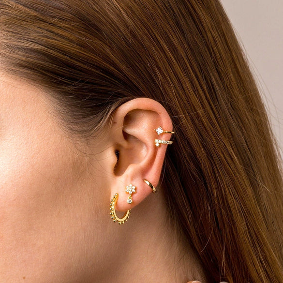 Wholesale Women's Silver Needle And Copper Earrings With Star Pattern And Electroplating Treatment