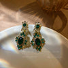 Wholesale Women's Silver Needle Earrings With Diamond And Emerald Inlay Geometric Design Alloy Material Exaggerated Elegant Light Luxury Style